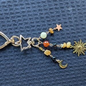 Celestial Charm Keychain with Star and Sun Accents